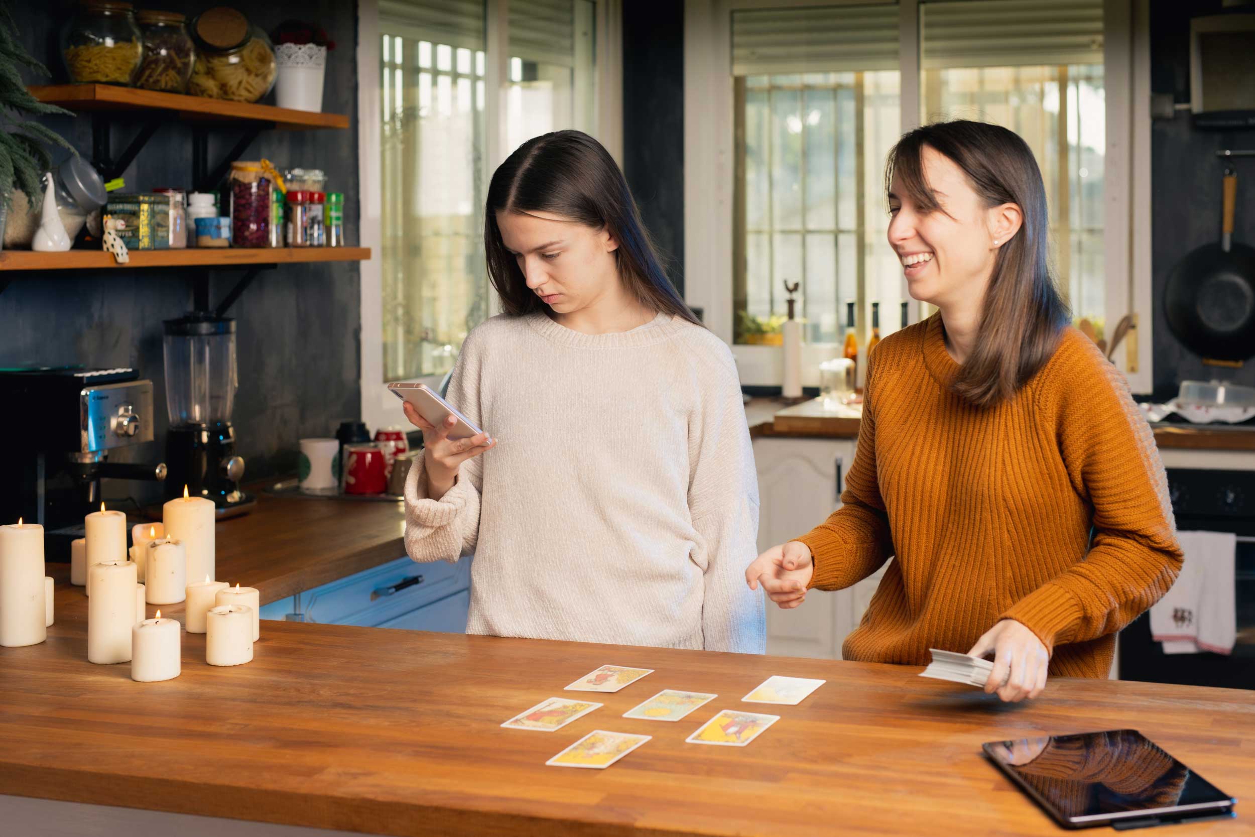 Two Women at Home Looking at Tarot Cards